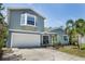 Charming two-story home with a two car garage, bay window and landscaping at 12913 126Th Ter, Largo, FL 33774