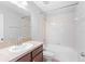 A full bathroom featuring vanity, toilet and tub with shower at 13174 Royal Pines Ave, Riverview, FL 33579