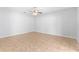 Large bedroom featuring tile flooring and a ceiling fan at 13174 Royal Pines Ave, Riverview, FL 33579