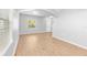 Spacious living room boasts wood floors, a bright window, and neutral walls for a modern feel at 13174 Royal Pines Ave, Riverview, FL 33579