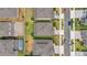 Aerial view of the backyard highlighting a green lawn, landscaping, and the proximity of neighboring houses at 13855 Sharp Hawk Dr, Riverview, FL 33569