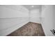 Walk-in closet with carpet and shelving at 13855 Sharp Hawk Dr, Riverview, FL 33569