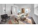 Home office with a modern desk, stylish decor, and a bright, airy atmosphere at 13855 Sharp Hawk Dr, Riverview, FL 33569