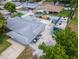 Rear aerial view of home showing a large RV Parking pad and fenced-in backyard at 1398 Lemon St, Clearwater, FL 33756