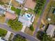 Birds-eye view of a property with a backyard pool, RV parking and updated hardscape at 1398 Lemon St, Clearwater, FL 33756