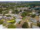 Overhead view of the home and its position within a quiet, tree-lined neighborhood at 1398 Lemon St, Clearwater, FL 33756