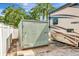 Spacious back yard featuring a utility shed, parking for RV, and a gravel surface at 1398 Lemon St, Clearwater, FL 33756
