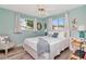 Comfortable bedroom with natural light, coastal accents, and ample space for relaxation at 1398 Lemon St, Clearwater, FL 33756