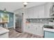 Bright kitchen boasts modern appliances, sleek countertops, and subway tile backsplash at 1398 Lemon St, Clearwater, FL 33756