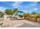 Spacious driveway for RV parking with gravel surface and privacy fence at 1398 Lemon St, Clearwater, FL 33756