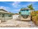 Spacious parking pad, complete with hook ups for RV parking. Privacy fence visible at 1398 Lemon St, Clearwater, FL 33756