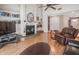 Bright living room featuring a fireplace and built-in shelving at 16015 Glen Haven Dr, Tampa, FL 33618