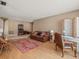 Comfortable living room with hardwood floors, traditional furniture and accents at 16015 Glen Haven Dr, Tampa, FL 33618