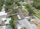 An aerial view of the home shows the back yard, with easy access to the pool and several seating areas at 1624 Chateau Dr, Clearwater, FL 33756