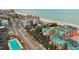 Aerial view of the beachfront community, beach, and adjacent buildings at 18400 Gulf Blvd # 1105, Indian Shores, FL 33785