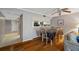 Dining room with seating for six and stylish decor adjacent to kitchen at 18400 Gulf Blvd # 1105, Indian Shores, FL 33785