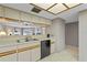 Efficient kitchen design with sleek appliances and ample cabinet space and view to living room at 18400 Gulf Blvd # 1105, Indian Shores, FL 33785