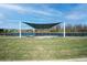 Covered event space with scenic views of the water, perfect for community gatherings and celebrations at 18933 Sailors Delight Pass, Land O Lakes, FL 34638