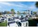 A poolside lounge area with stylish couches and tables, ideal for relaxing and enjoying the beautiful surroundings at 18933 Sailors Delight Pass, Land O Lakes, FL 34638