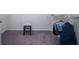 Spacious walk-in closet featuring carpet flooring, a stool, and wire shelving at 18933 Sailors Delight Pass, Land O Lakes, FL 34638