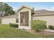 This home features a cozy screened front porch, providing a relaxing outdoor space at 2436 Nantucket Harbor Loop # 104, Sun City Center, FL 33573