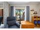 This bedroom has a sliding glass door to the outside balcony and a lot of storage at 2626 2Nd Ct, Palm Harbor, FL 34684