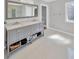Bright bathroom featuring a double vanity with ample storage and modern fixtures at 2802 Northpointe Ln, Tampa, FL 33611