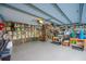 Spacious garage featuring an epoxy floor, ample storage, and a bicycle rack at 2802 Northpointe Ln, Tampa, FL 33611