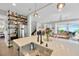 Modern kitchen with stainless steel appliances, sleek countertops, and open shelving showcasing stylish decor at 2802 Northpointe Ln, Tampa, FL 33611