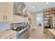 Spacious kitchen with stainless steel oven and white cabinets at 2802 Northpointe Ln, Tampa, FL 33611