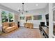 Cozy living room features abstract artwork, a comfortable couch, and stylish lighting at 2802 Northpointe Ln, Tampa, FL 33611
