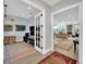 Open-concept home with hardwood flooring and neutral paint at 2802 Northpointe Ln, Tampa, FL 33611