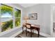 Office area with natural light and a view of the water at 2802 Northpointe Ln, Tampa, FL 33611