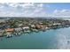 Waterfront home with dock and pool highlighted by a beautiful waterfront community at 297 1St W St, Tierra Verde, FL 33715