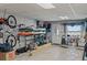 Well-equipped garage space with storage racks and multiple bikes at 297 1St W St, Tierra Verde, FL 33715