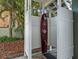 Enclosed outdoor shower featuring convenient access, perfect for rinsing off after beach visits at 297 1St W St, Tierra Verde, FL 33715