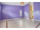 Large bedroom with tile flooring, plantation shutters, and an en-suite bathroom at 3013 Crest Dr, Clearwater, FL 33759