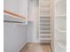 Walk-in closet with built in shelves and hanging space at 3013 Crest Dr, Clearwater, FL 33759