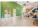 Expansive living room with high ceilings and a unique staircase design at 3013 Crest Dr, Clearwater, FL 33759