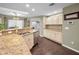 Lovely kitchen with granite countertops and stainless steel appliances at 3047 Lake Padgett Dr, Land O Lakes, FL 34639