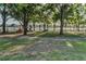 Scenic park playground with play equipment and lakeside views, perfect for Gathering fun at 3047 Lake Padgett Dr, Land O Lakes, FL 34639