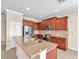 Well-appointed kitchen featuring stainless steel appliances, granite countertops, and ample cabinetry at 310 Cedar Falls Dr, Apollo Beach, FL 33572