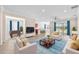 Bright living room showcasing tile flooring, comfortable seating, and an open layout at 310 Cedar Falls Dr, Apollo Beach, FL 33572