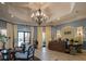 Welcoming clubhouse lobby with elegant chandelier, comfortable seating, and professional reception area at 310 Cedar Falls Dr, Apollo Beach, FL 33572