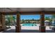 Picturesque view of the community pool area from covered seating area at 310 Cedar Falls Dr, Apollo Beach, FL 33572