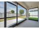 View from screened-in lanai to the backyard at 32714 Brooks Hawk Ln, Wesley Chapel, FL 33543