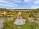 Community water park featuring splash pad, tower, and lush landscaping in a desirable neighborhood at 32714 Brooks Hawk Ln, Wesley Chapel, FL 33543