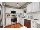 Stylish kitchen featuring white cabinetry, stainless steel appliances, and marble countertops at 3301 8Th N Ave, St Petersburg, FL 33713