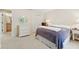 Comfortable bedroom featuring a window, closet, dresser, and carpeted floors at 3505 Tarpon Woods Blvd # K409, Palm Harbor, FL 34685