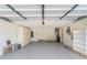 Spacious two-car garage with built in cabinets and ample storage space at 3956 Tarpon Pointe Cir, Palm Harbor, FL 34684